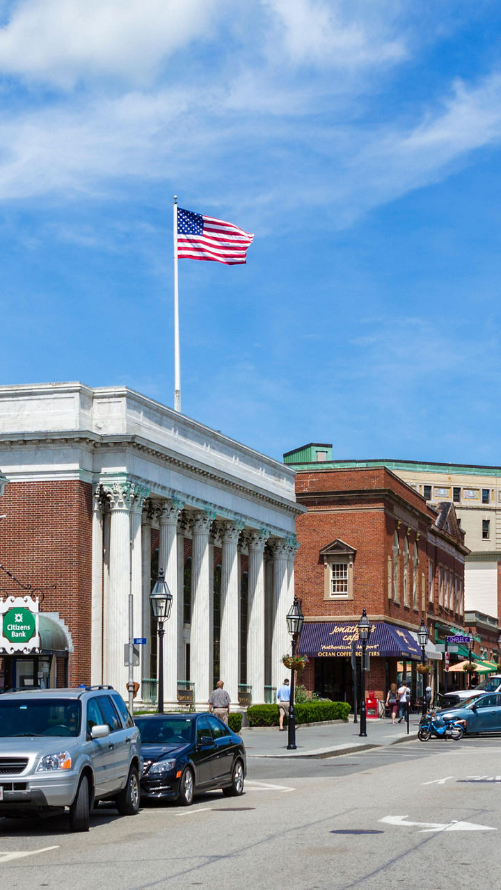 Historic street with American flag and buildings