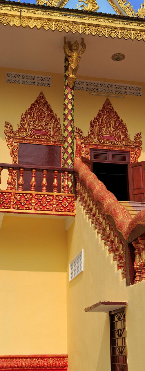 Golden temple with ornate staircase design