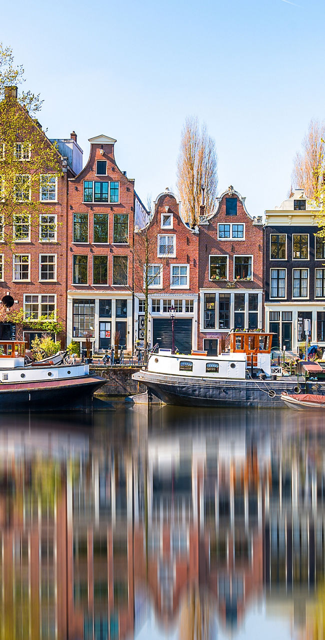 Scenic canal view in Amsterdam with boats