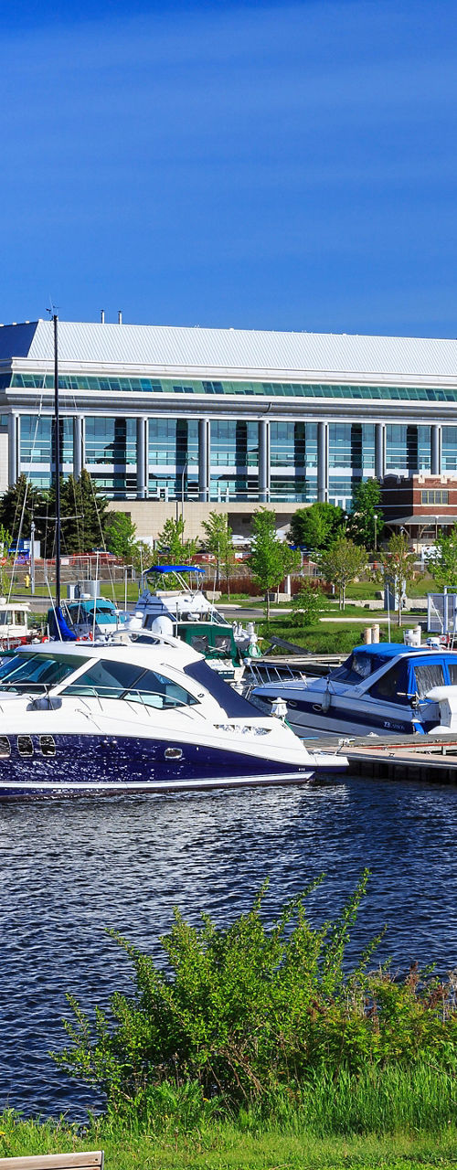 Scenic marina with yachts and waterfront buildings