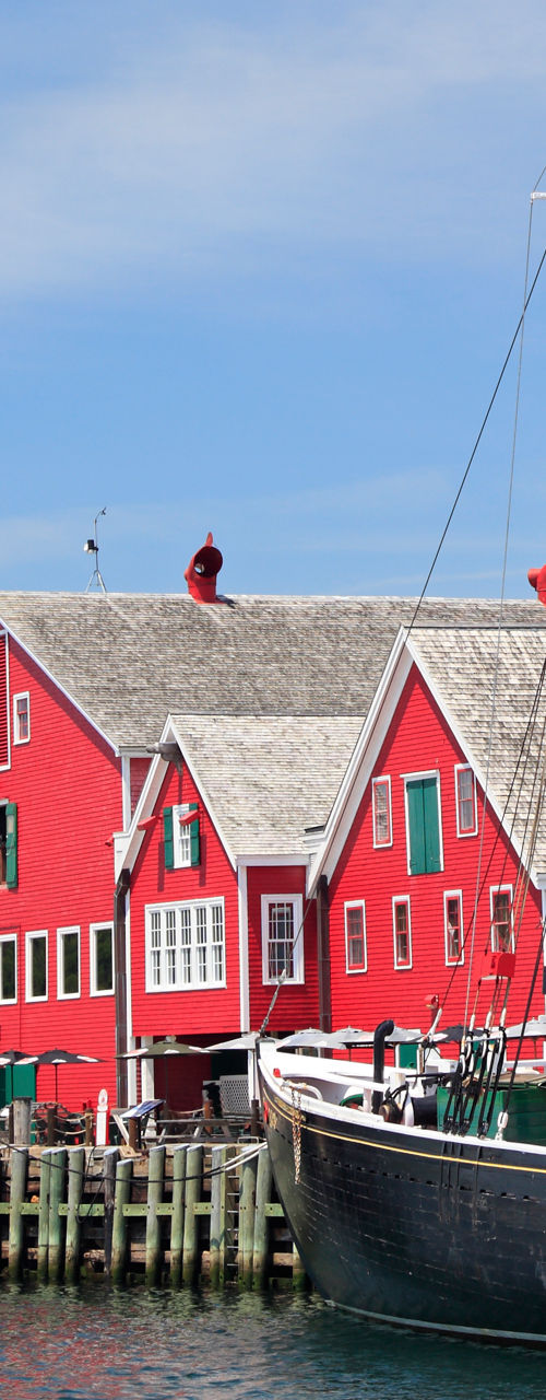 Historic red harbor with docked ships