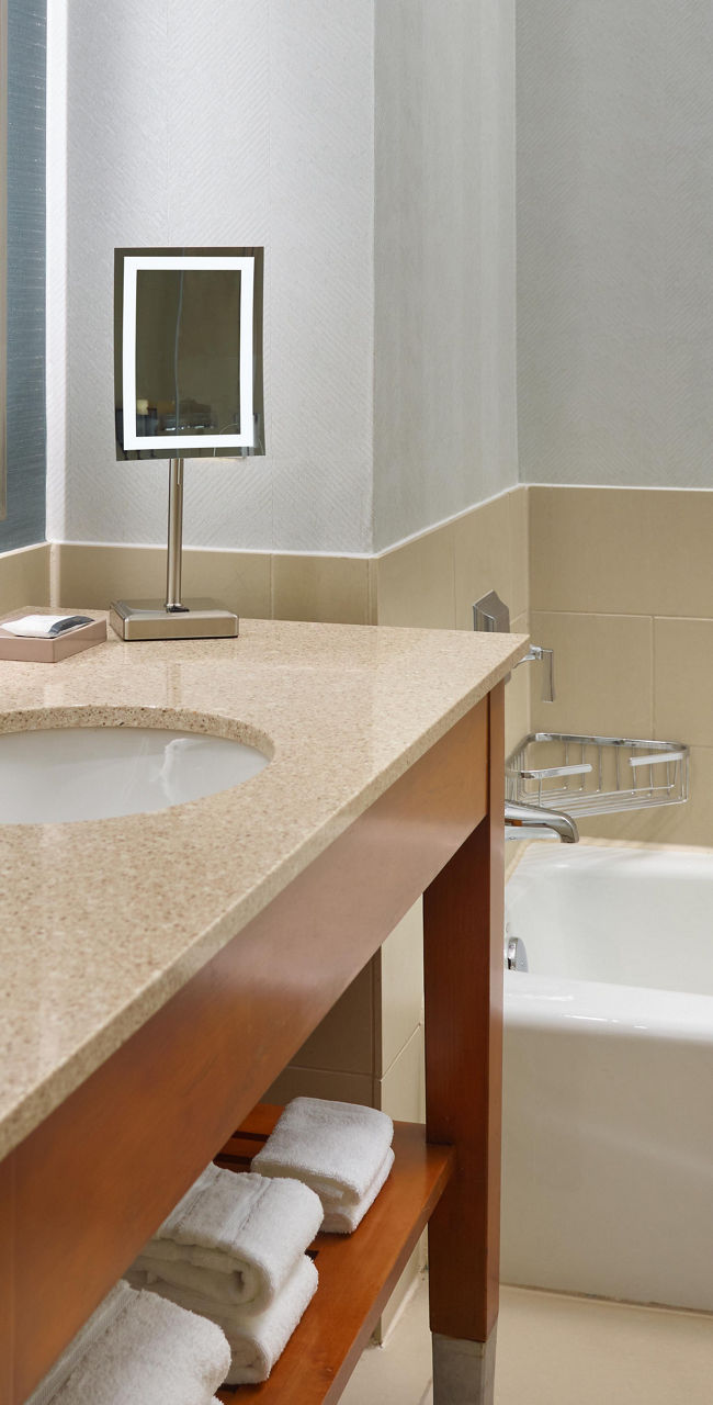 Modern hotel bathroom with accessible features