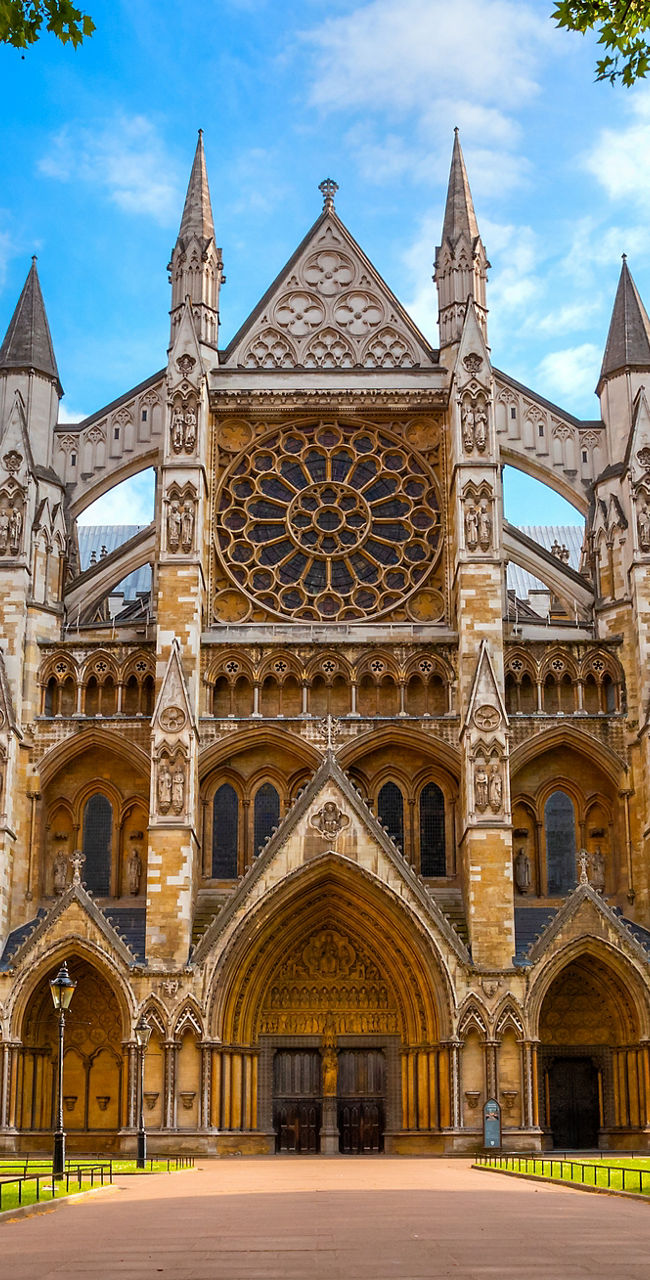 Majestic Westminster Abbey under blue sky