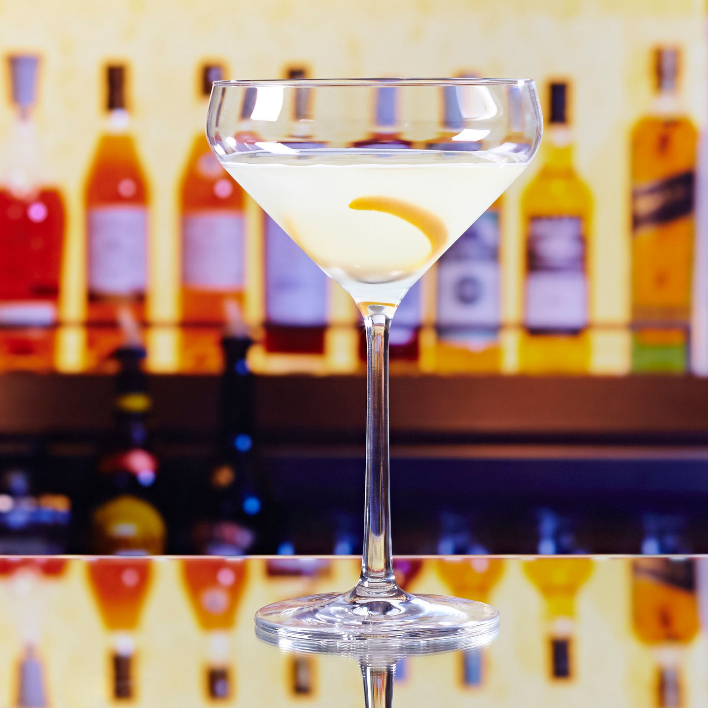 Elegant cocktail glass with lemon twist