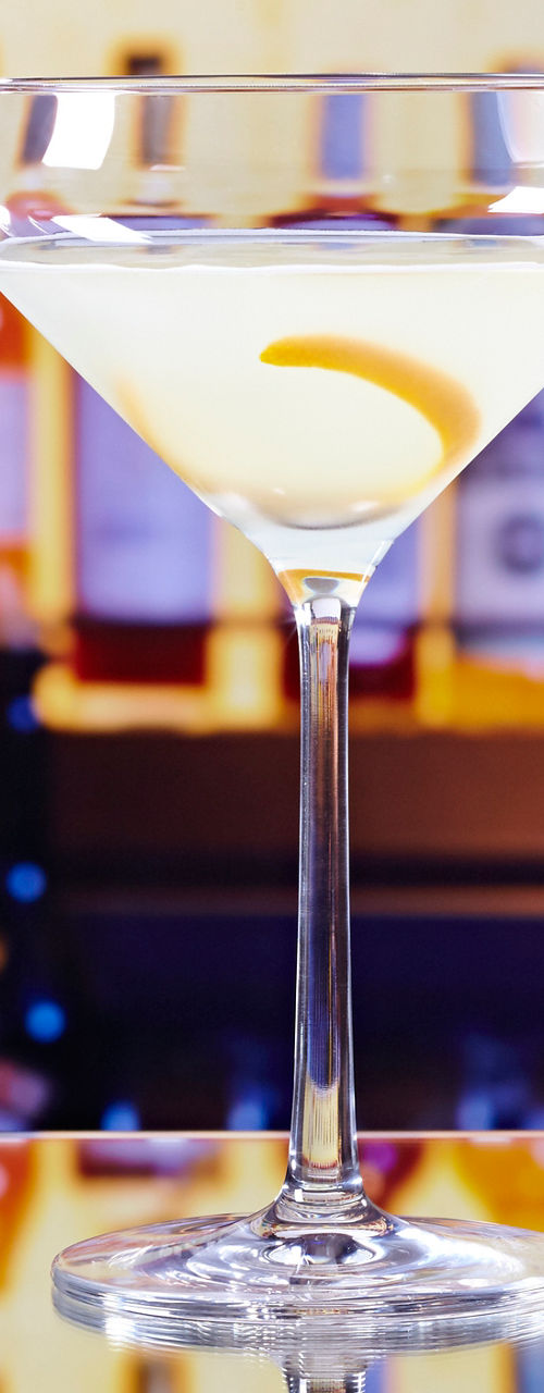 Elegant cocktail glass with lemon twist
