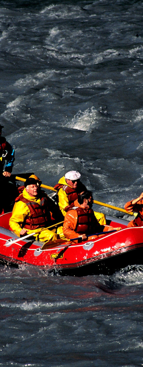 Group rafting on turbulent river waters