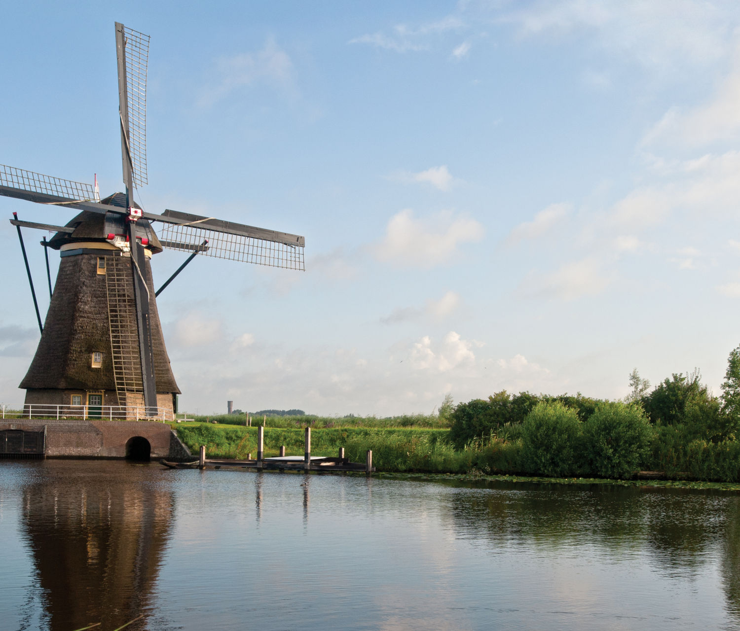 Working windmills beside a canal at Kinderdijk