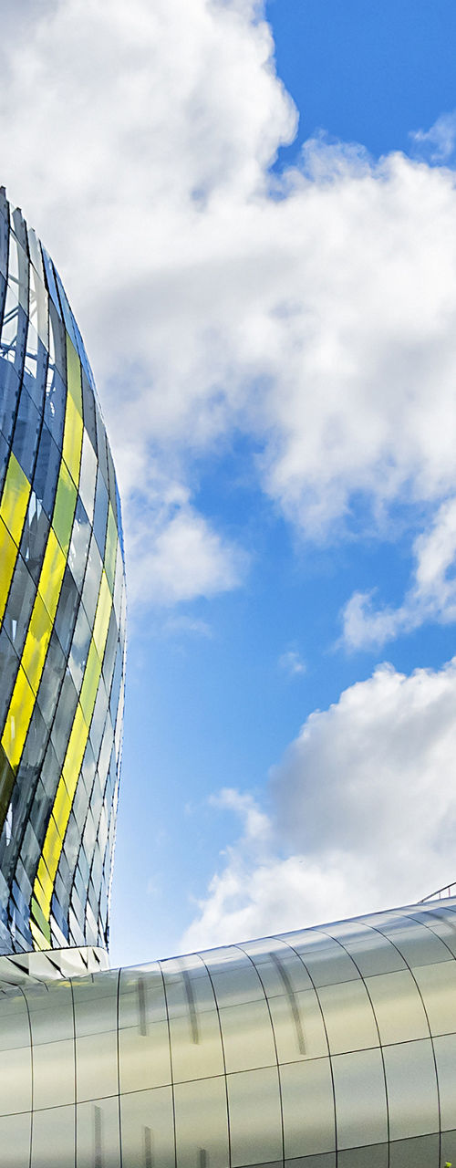 Modern architectural building with curved glass facade