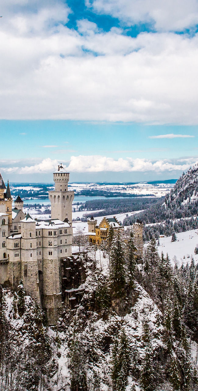 Neuschwanstein Castle in snowy winter landscape