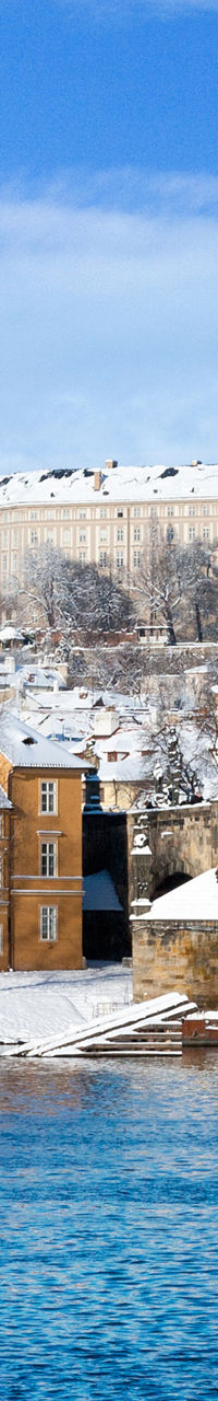 Snowy Prague cityscape with Charles Bridge