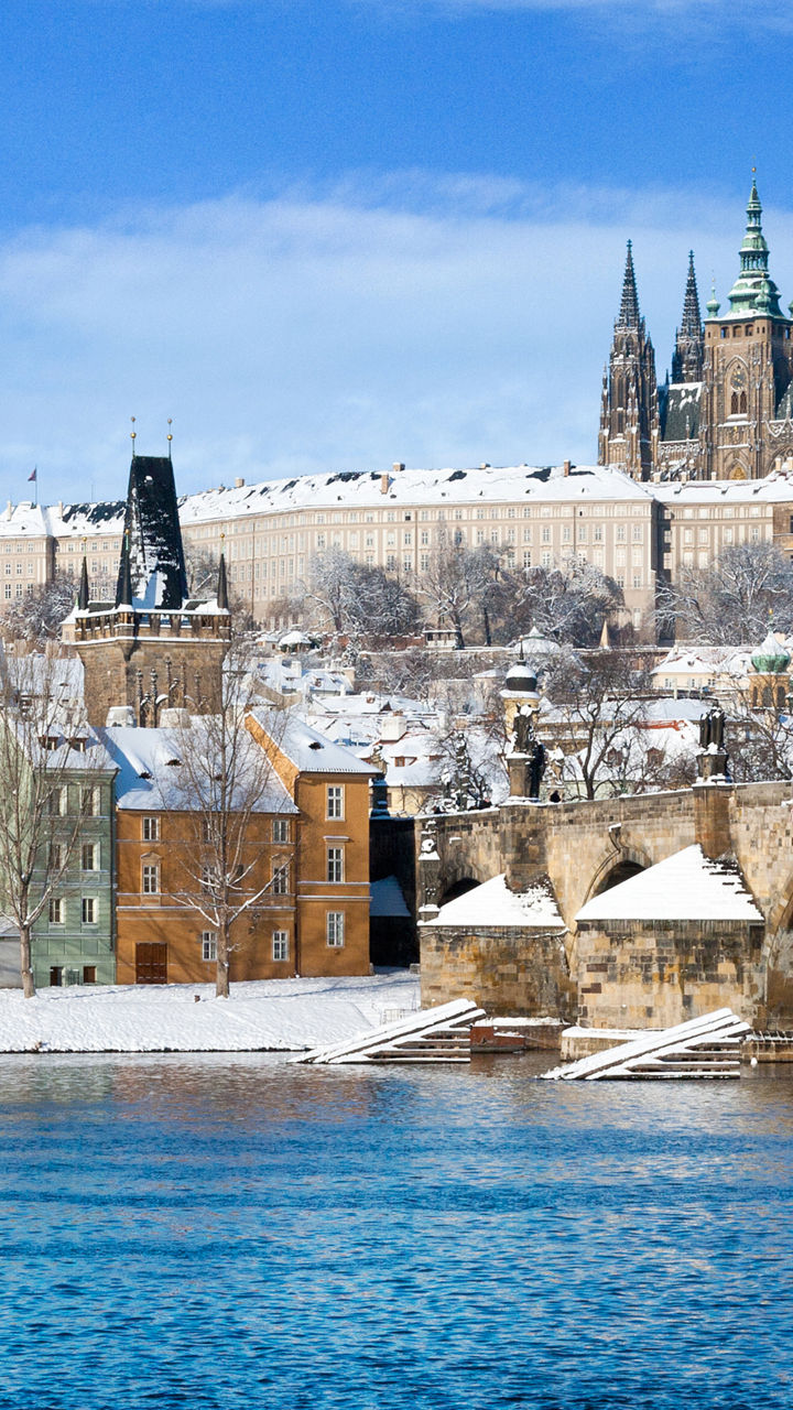 Snowy Prague cityscape with Charles Bridge