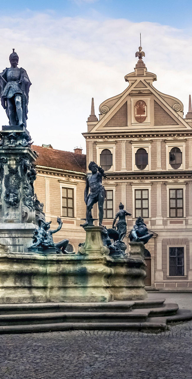 Historic courtyard fountain with classical statues