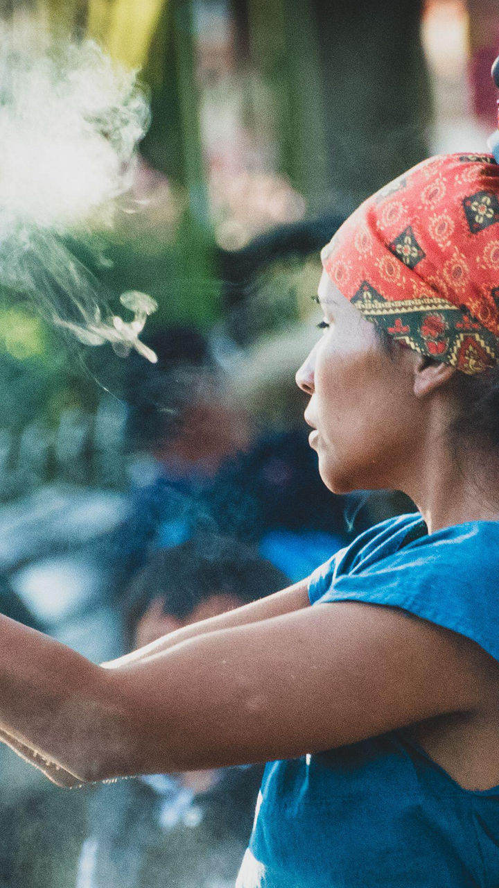 Traditional Ritual with Feathered Headdress