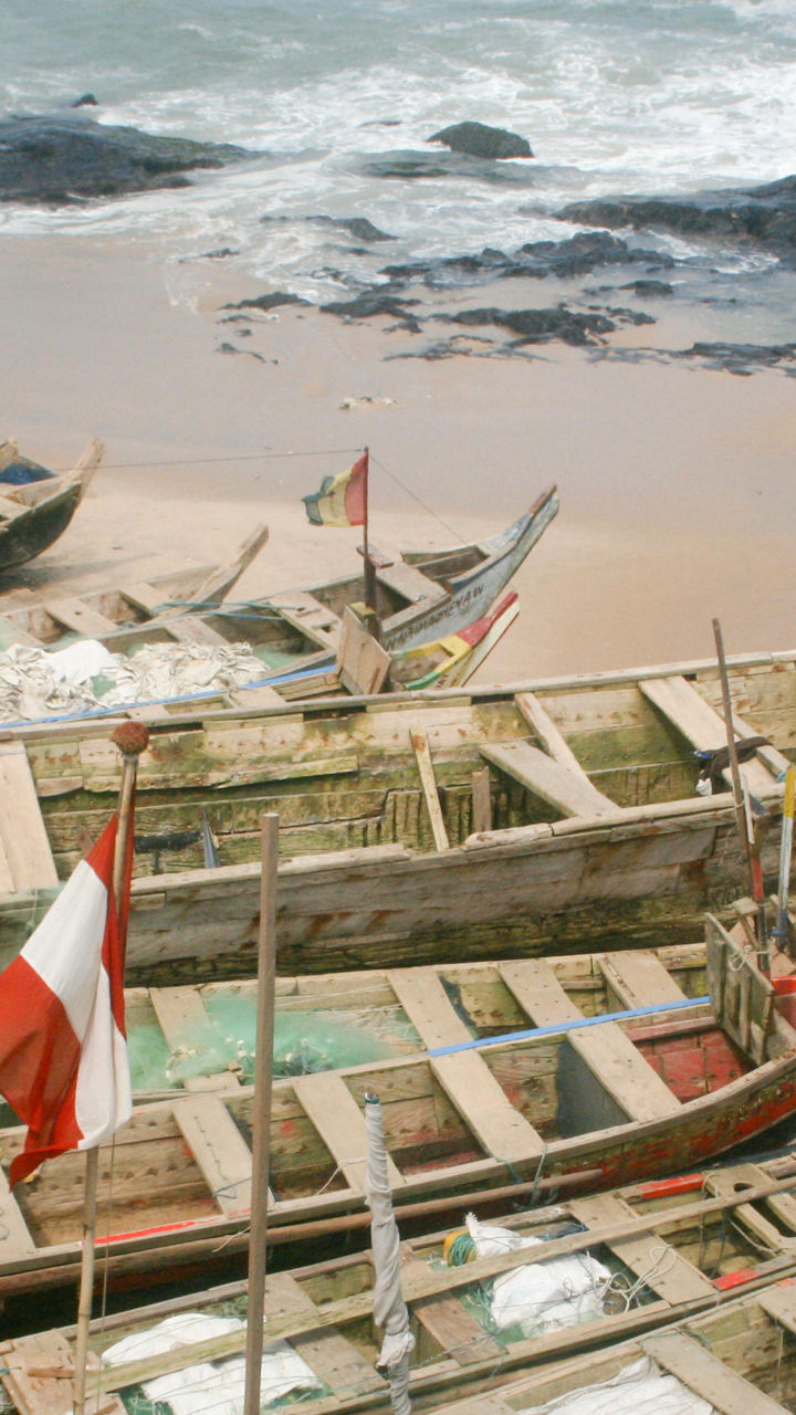 Wooden fishing boats on sandy beach