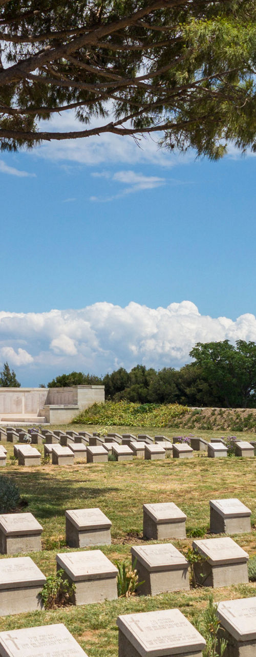Serene war cemetery under a sunny sky