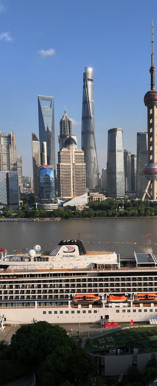 Shanghai skyline with cruise ship docked