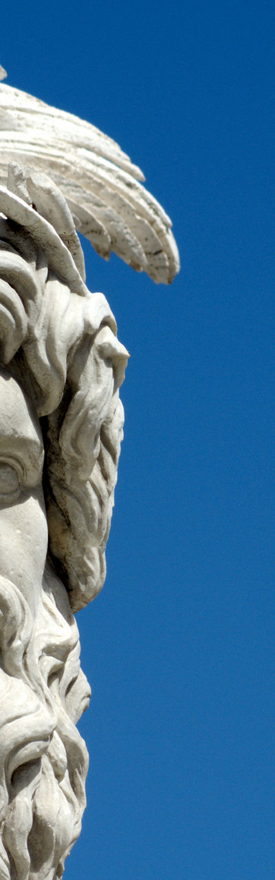 Stone sculpture of a mythological figure