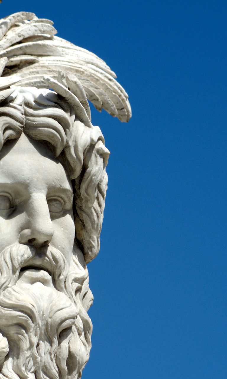 Stone sculpture of a mythological figure